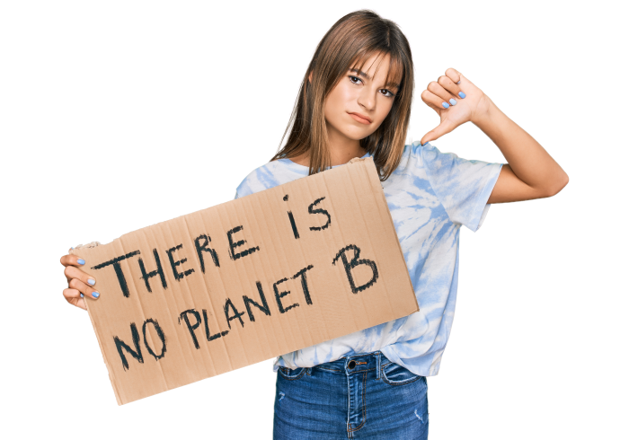 Teenager holding a sign which reads "There is no planet B"