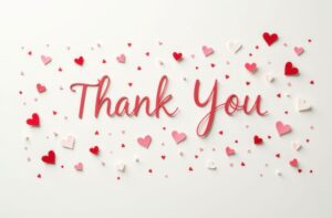 White background with lots of red, pink & white hearts. Words "Thank-you" are in red in the middle